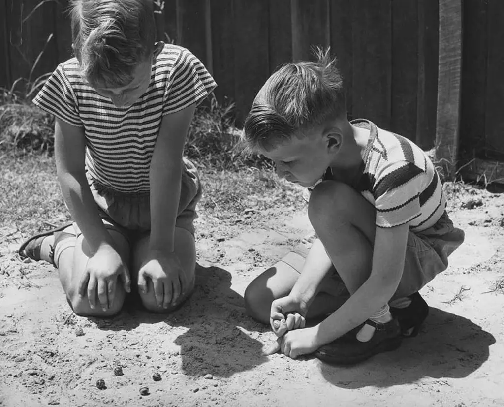 Two Boys Pitching Marbles